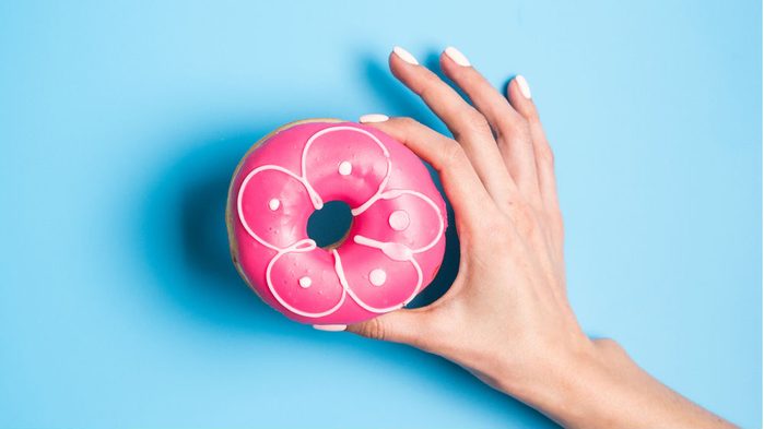 cheat meals good, a woman holding a donut, or a doughnut