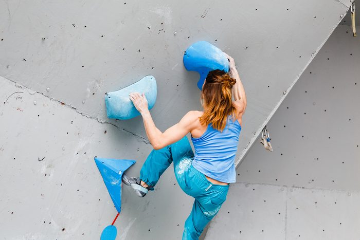 fun ways to stay in shape_woman rock climbing 