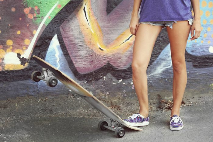 fun ways to stay in shape_ woman with skateboard