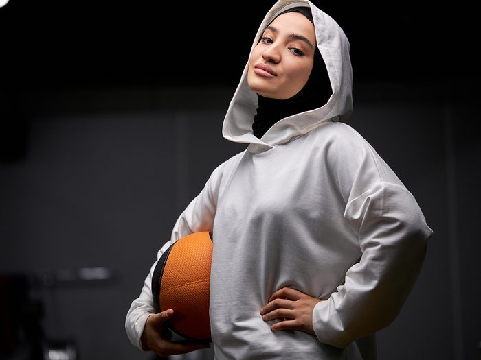 how to become an athlete | Arabic,sportswoman,with,ball,in,hands,ready,to,play,basketball,