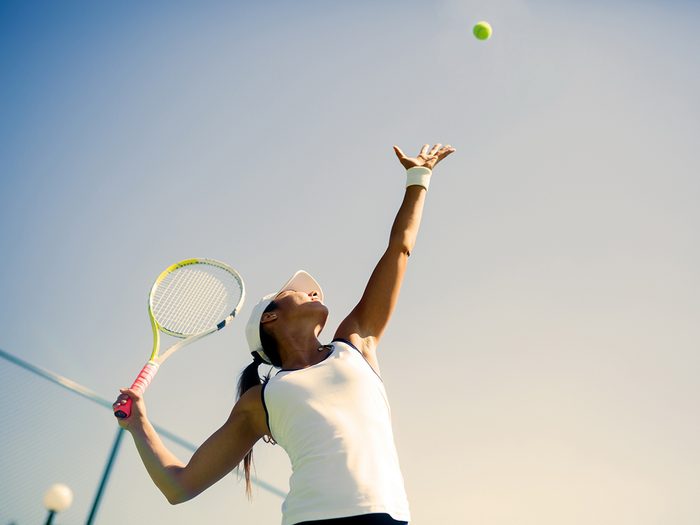 how to become an athlete | Beautiful,female,tennis,player,serving,outdoor