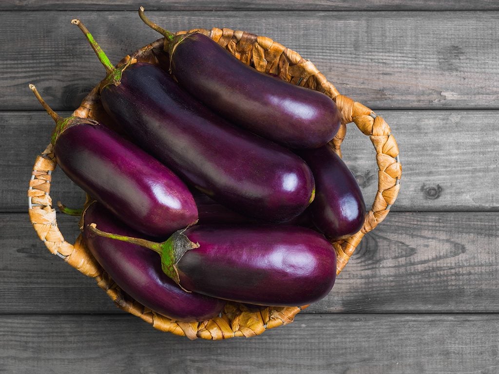 Nightshade vegetables, Basket of purple eggplants