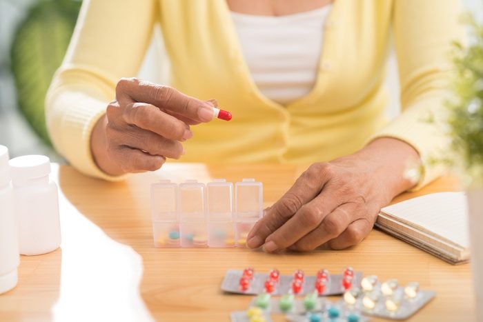 women hurt their health_woman with pills