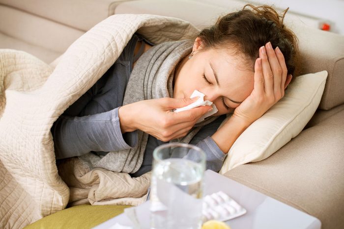 stay healthy during the holidays - woman sick