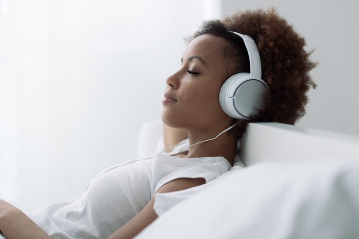 woman listening to audio book _get deeper sleep