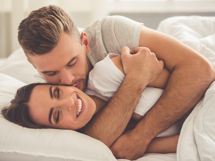 Gynecologist, couple cuddling in bed