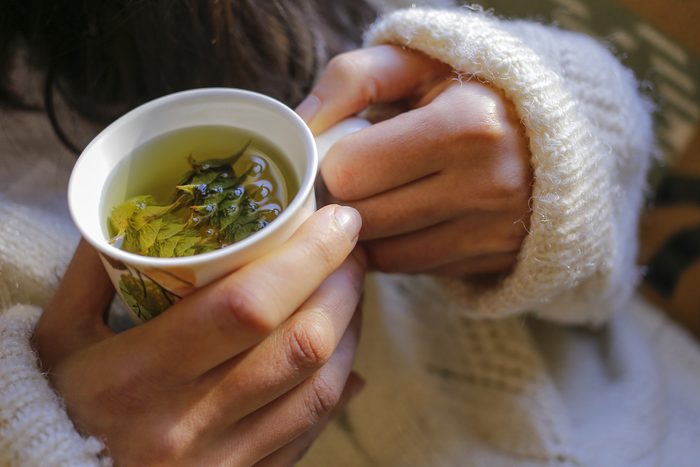 stay healthy during the holidays - holding tea
