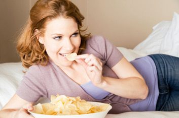 woman eating chips
