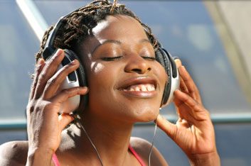 woman smiling with headphones