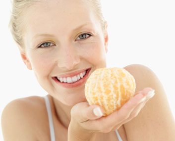 healthy eating woman orange fruit