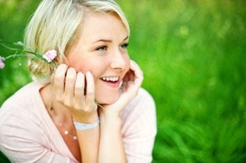 woman smiling grass happy blonde