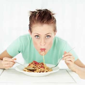 heartburn pasta woman eating