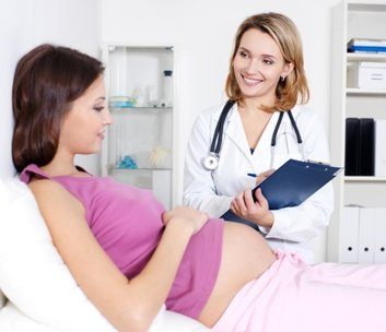 midwife pregnant woman