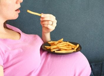 pregnant woman with fries