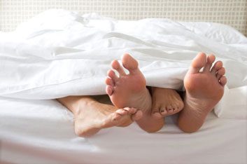 feet in bed