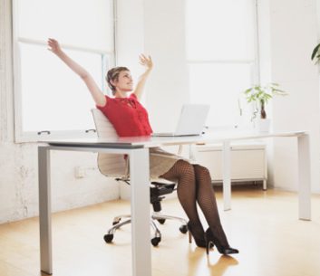stretching fidgeting woman desk work