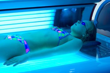 teen in tanning bed
