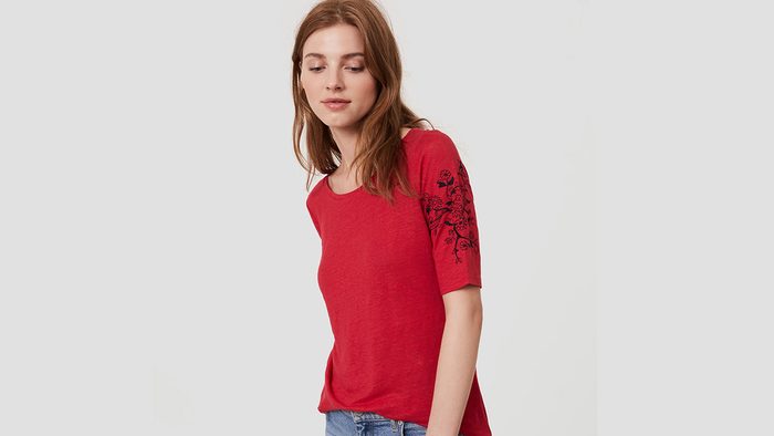 Red fashion tee with embroidery on the sleeve