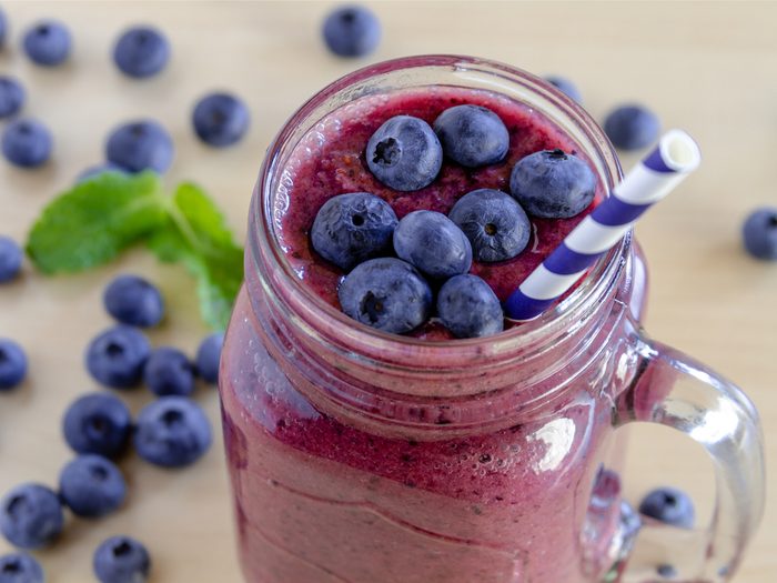 A healthy breakfast fruit smoothie recipe with blueberries, orange and yogurt.