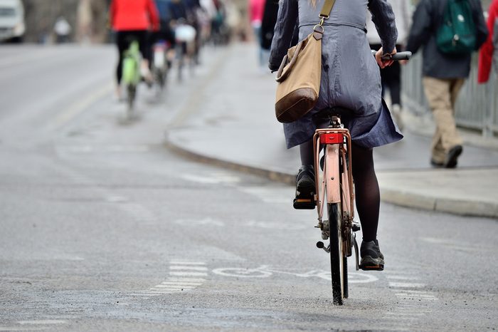 woman biking to work_Easy Eco-Habits 