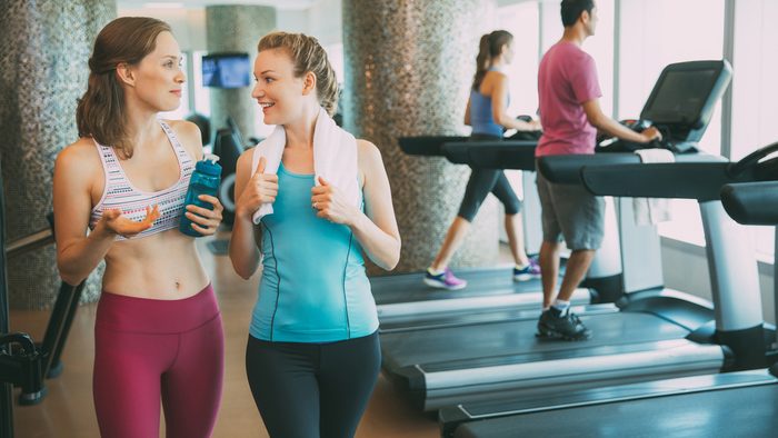 Exercise Prescription for heartdisease: women at the gym going from walking on the treadmill to lifting weights 