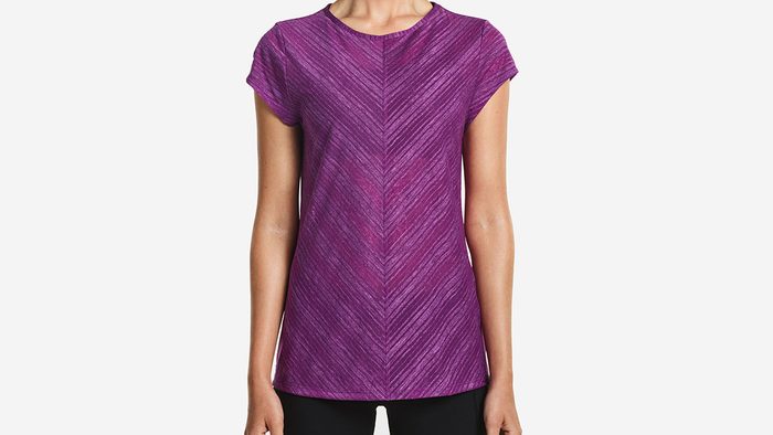 cycling at night, purple tee by Saucony