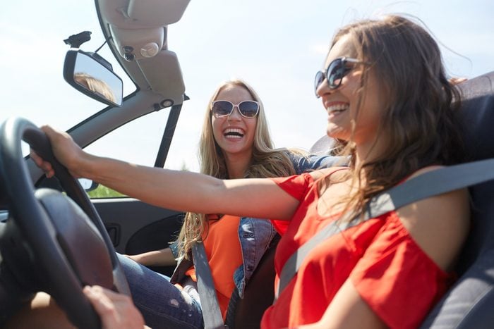 woman driving with friend _ stress-free commute 