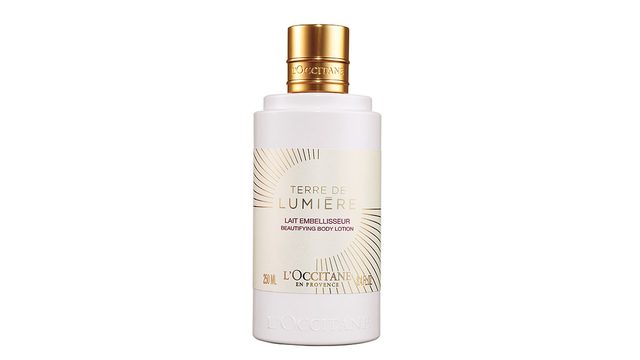 skin saver, bottle of L'occitane Lait Terre de Lumiere body lotion