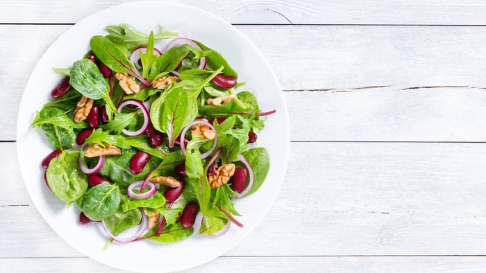 nutrient deficient magnesium, a green salad with nuts and beans