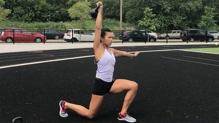 Kettlebell Moves For Abs: Overhead Walking Lunges