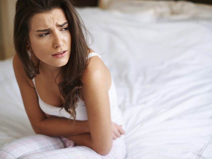 prevent urinary tract infections. woman suffering from a UTI
