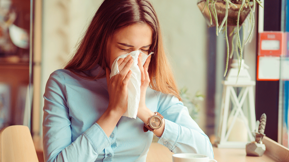 Help Stop Sneezing, woman with a tissue