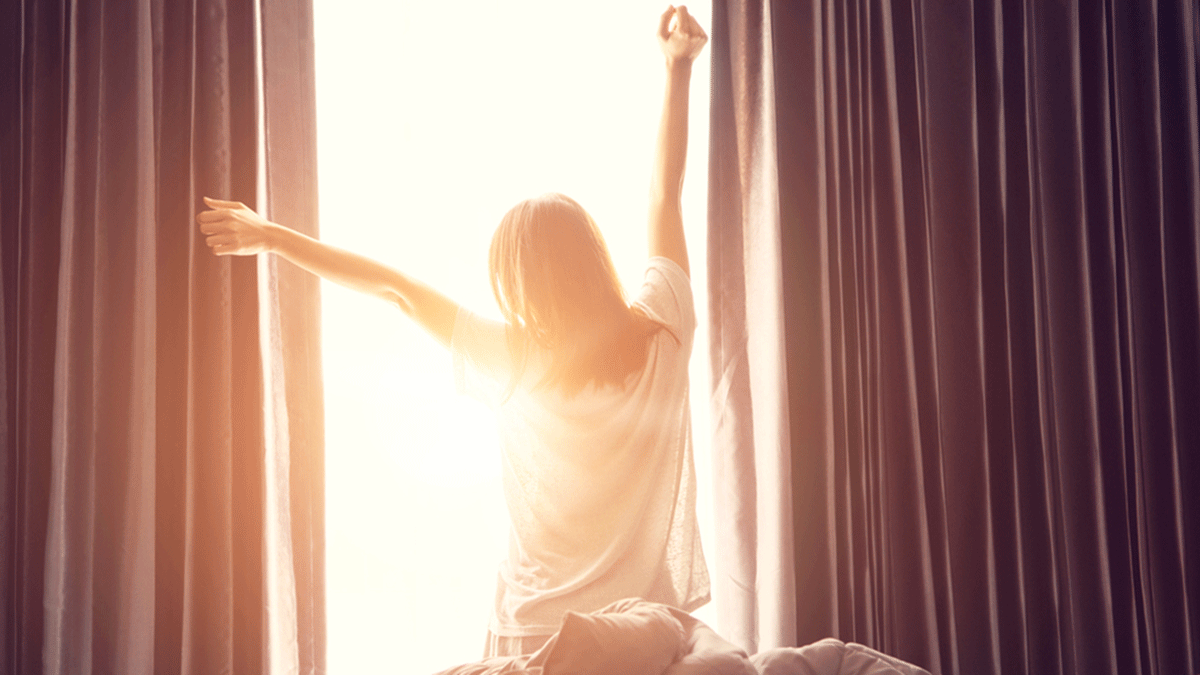Weight Loss Morning Routine, woman soaking up the sun in the morning