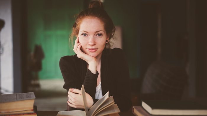 calm down now and get help, woman reading health books