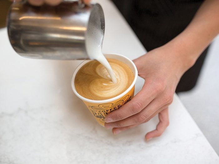 Balzac's Coffee, a latte being made