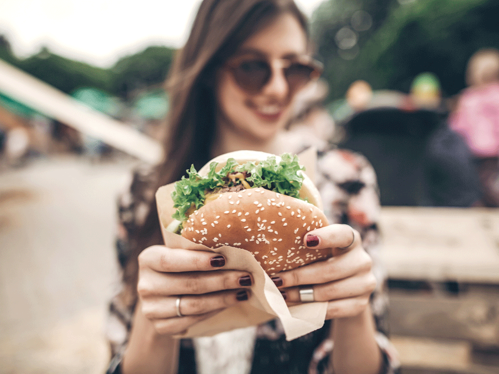 Stop Overeating Calorie Intake, girl eating burger 