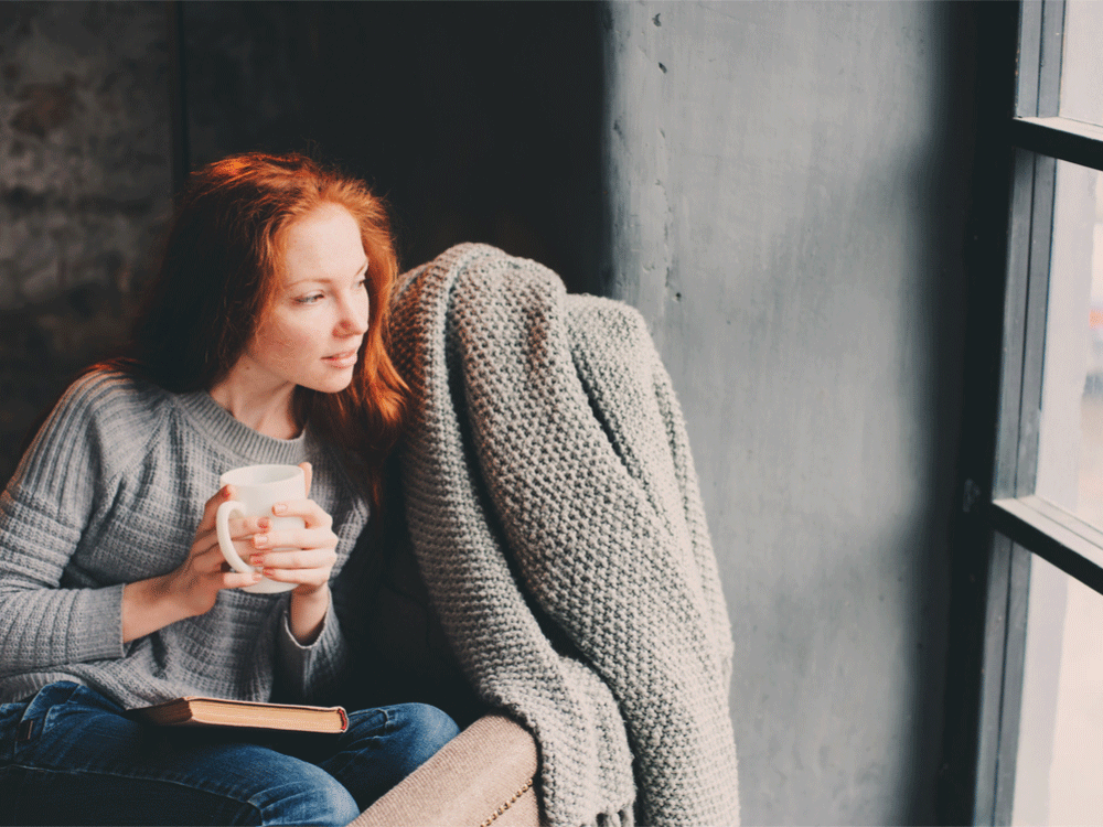 Winter Eye Care Indoors, woman drinking tea indoors