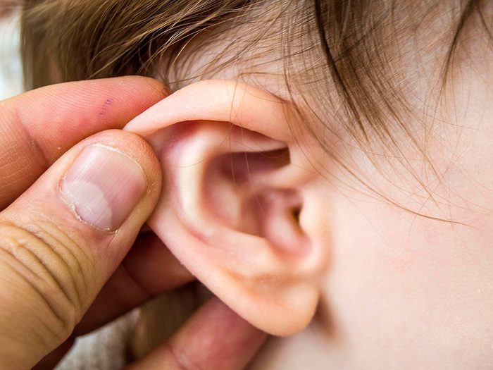 Health myth, A man checks a kid's ear for infection
