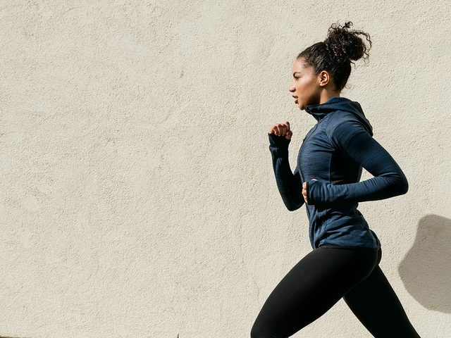 High cholesterol, fit woman running outdoors