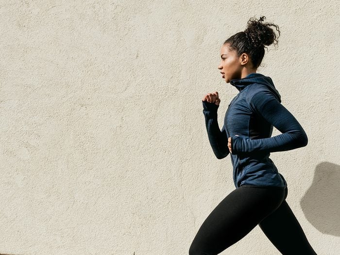 High cholesterol, fit woman running outdoors