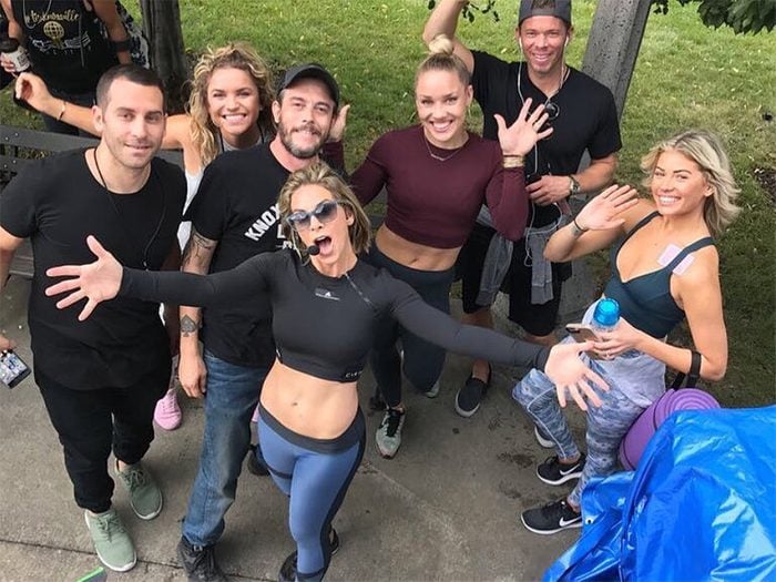 Jillian Michaels standing with a group of people before working out
