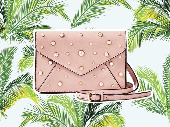 Pink clutch with pearl studs for vacation