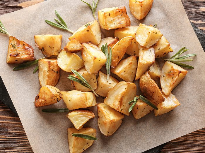 Weight loss myths, cut-up baked potatoes with rosemary