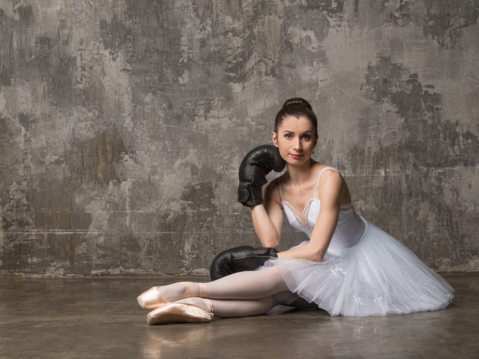 Health trends, a ballerina wearing boxing gloves