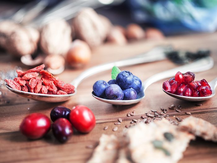 Health trends, superfood berries on spoons