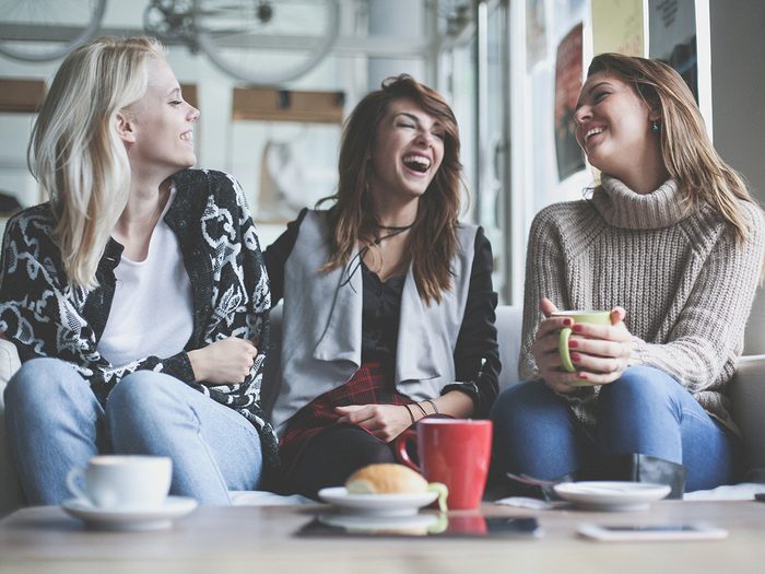 Intelligence, group of women having coffee and laughing together