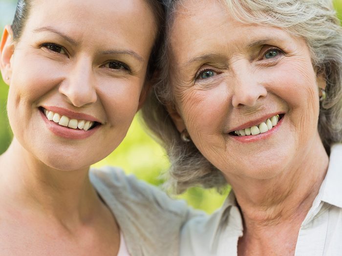 Menopause symptoms, an adult mother and daughter stand side by side