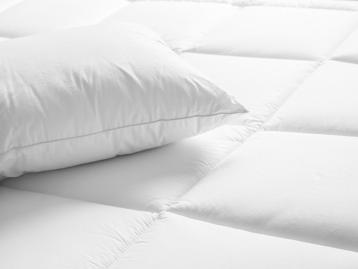 Allergies, white pillow and bed linens