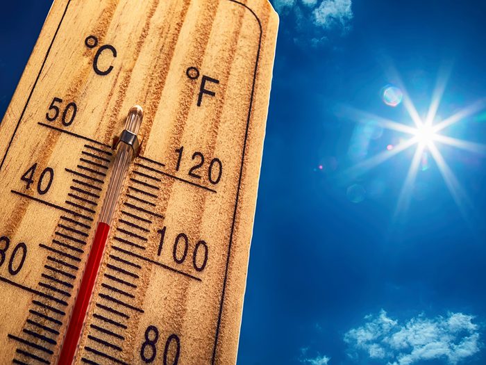 eczema, hot sunny day, thermometer shows warm temperature