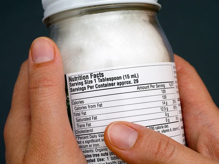 Extreme weight loss, a person reads the label on a jar